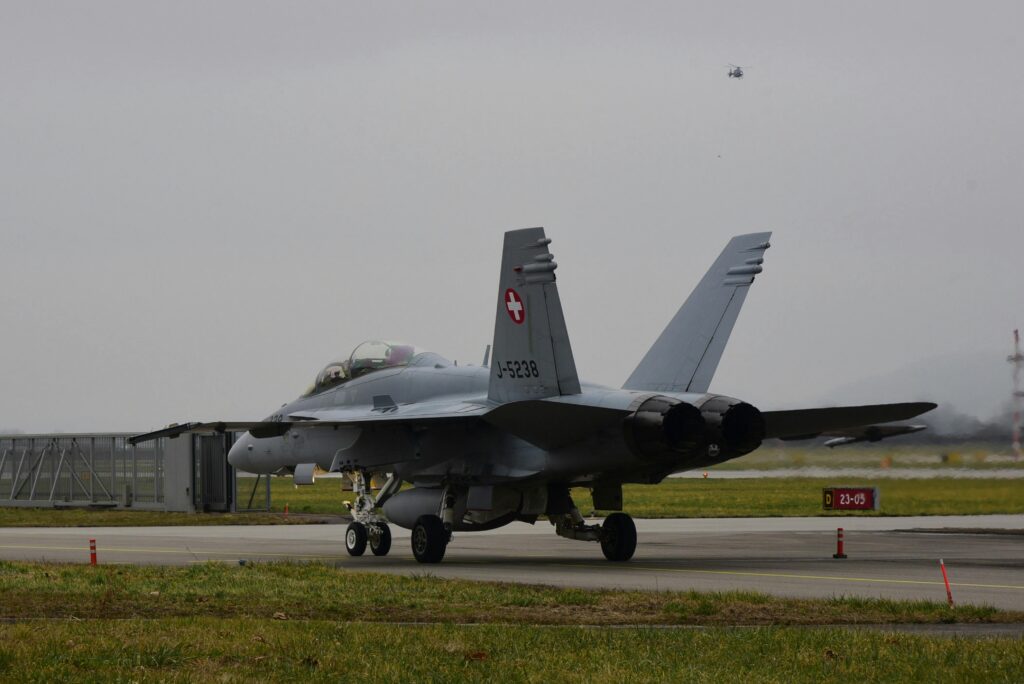 Swiss Air Force F/A-18 Hornet parked at Payerne airfield in Switzerland.