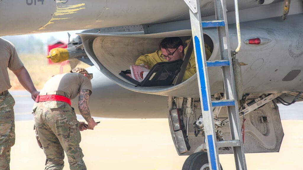 <a href="#advanced-aviation-safety" title="Jump to the section on advanced aviation safety systems used globally">Advanced Aviation Safety Systems</a><img decoding= Technicians working on a military aircraft at Aero India 2025 airshow in Bengaluru.